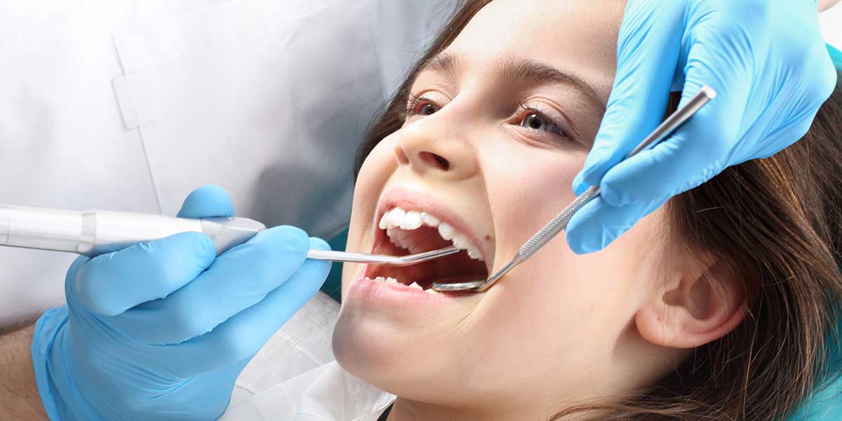 Young Child Having Mouth Examined